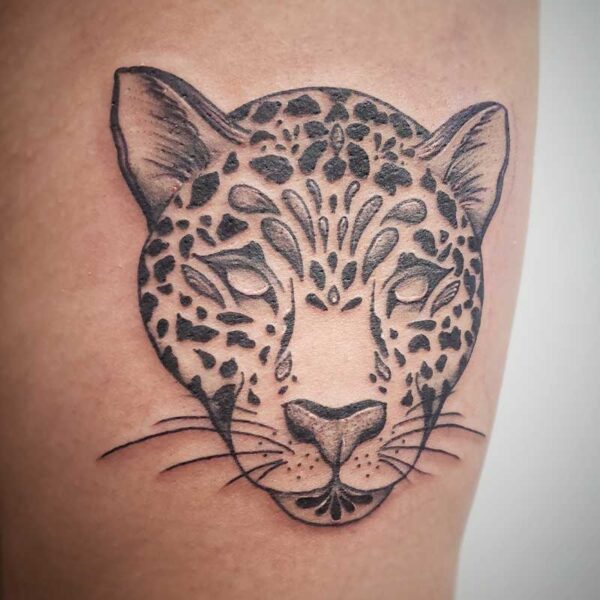 atticus tattoo, black and grey tattoo of a leopards face