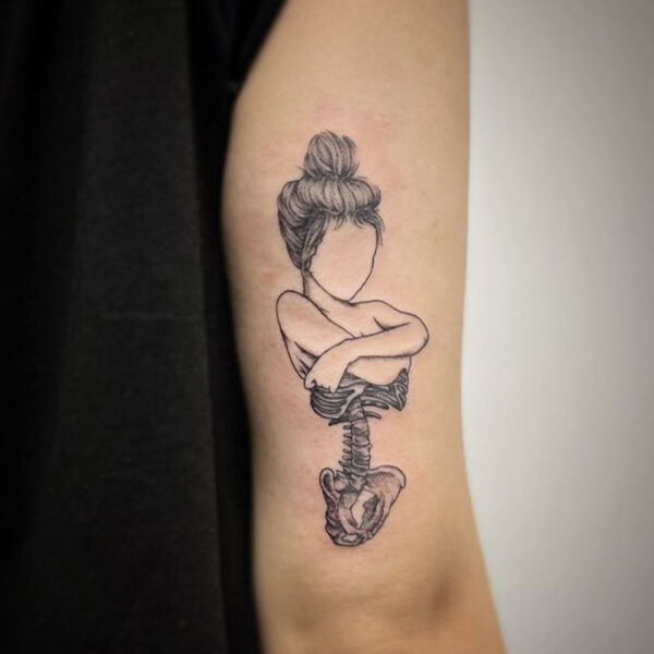 atticus tattoo, black and grey tattoo of a woman removing her skin and exposing her skeleton from the waist up