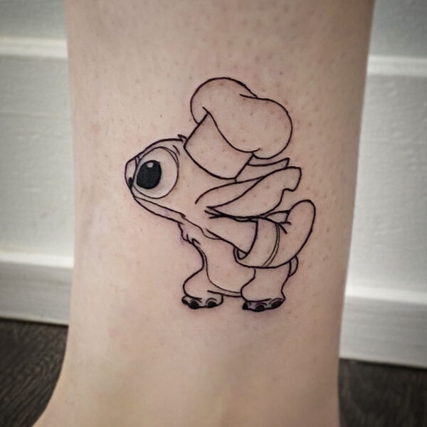 atticus tattoo, line tattoo of Stitch in a chef's hat and over mitts