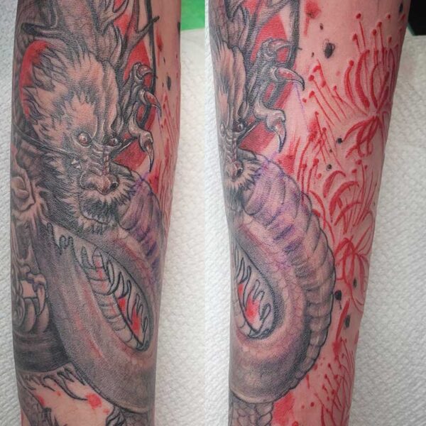 atticus tattoo, black and red tattoo of an Eastern Dragon