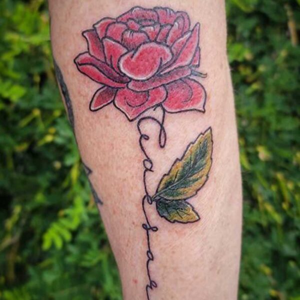 atticus tattoo, tattoo of a red rose with a name as the stem