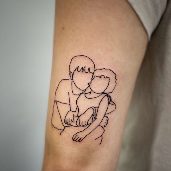 atticus tattoo, line tattoo of two kids cuddling