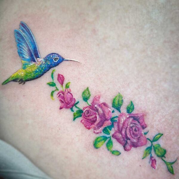 atticus tattoo, coloured tattoo of a hummingbird with roses