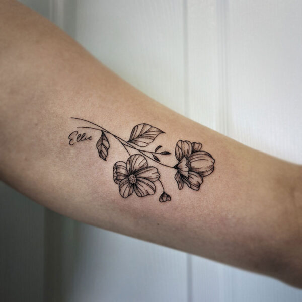 atticus tattoo, fine line tattoo of a stem of flowers
