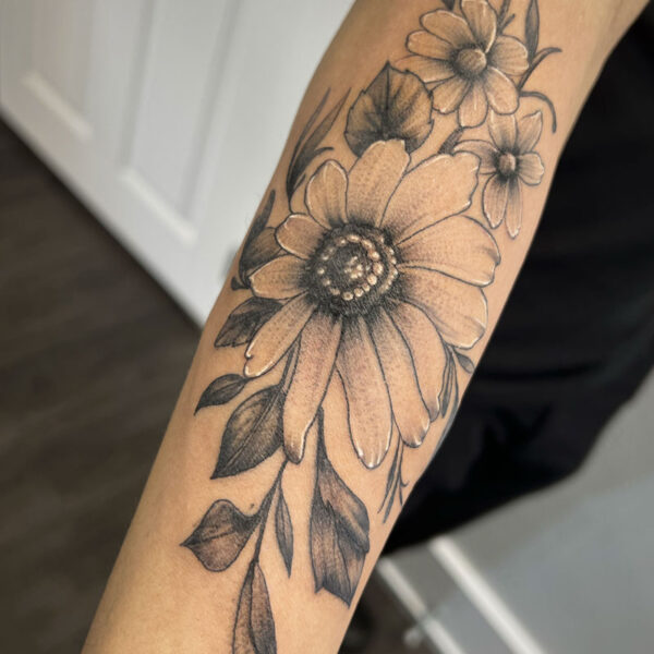 atticus tattoo, fineline tattoo of flowers