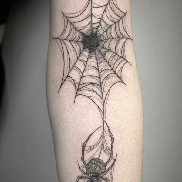 atticus tattoo, black and grey tattoo of a spider web and spider monster