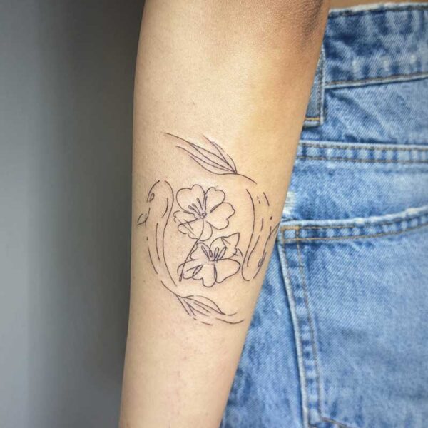 atticus tattoo, fine line tattoo of two fish and flowers