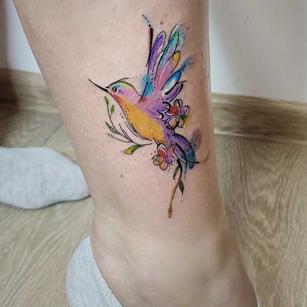 atticus tattoo, watercolour tattoo of a hummingbird