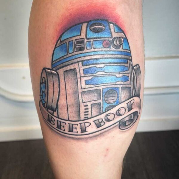 atticus tattoo, coloured neotraditional tattoo of R2D2