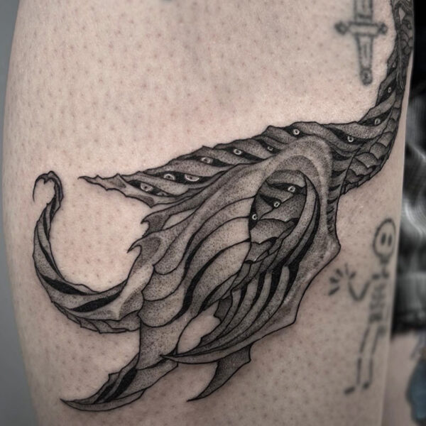 atticus tattoo, black and grey tattoo of the loch ness monster