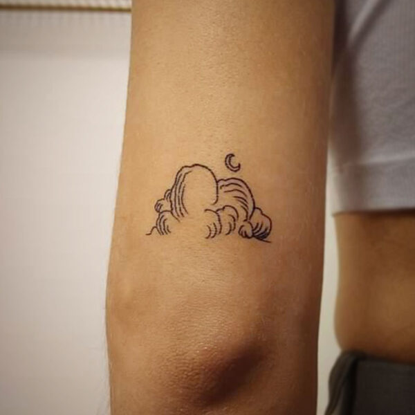 atticus tattoo, fine line tattoo of clouds with a crescent moon