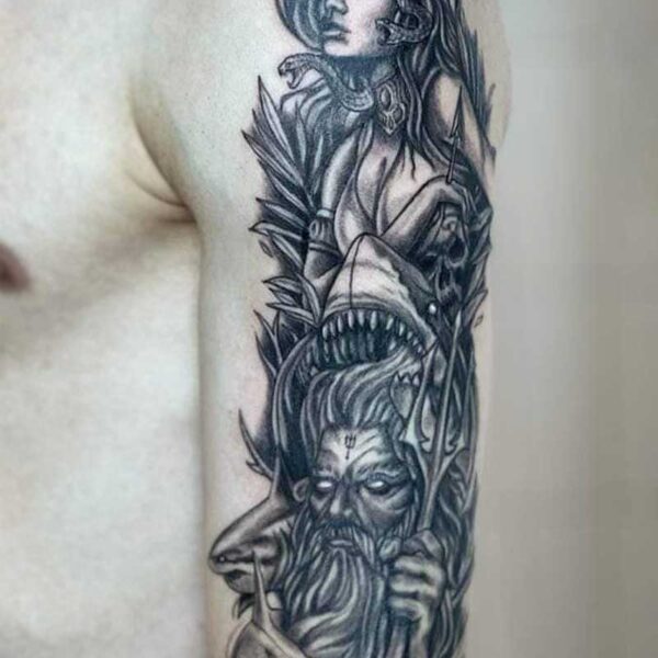 atticus tattoo, black and grey tattoo of a woman and a wizard