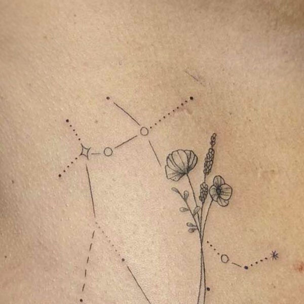 atticus tattoo, fine line tattoo of two constellations holding hands and flowers