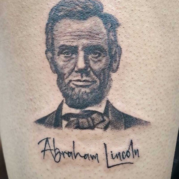 atticus tattoo, black and grey tattoo of Abraham Lincoln