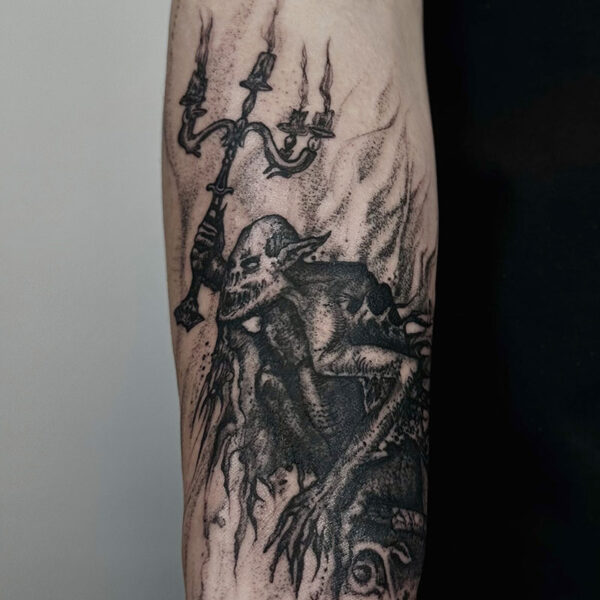 atticus tattoo, black and grey tattoo of a goblin holding a candelabra