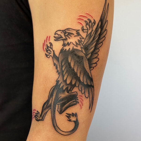 atticus tattoo, american traditional tattoo of an eagle