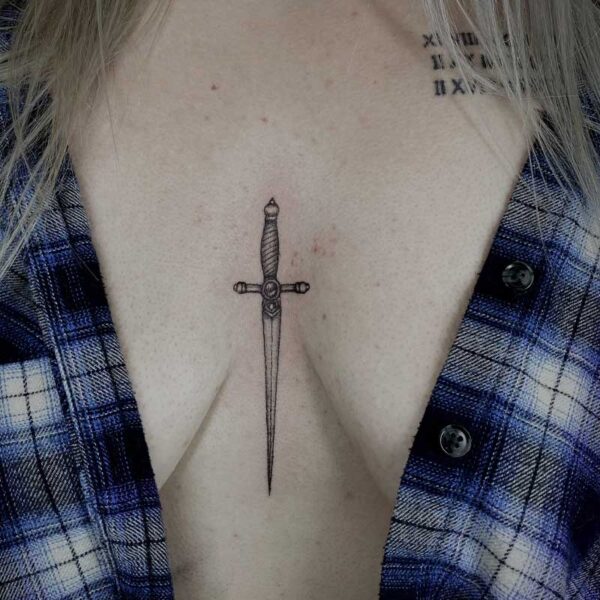 atticus tattoo, sternum tattoo of a small dagger
