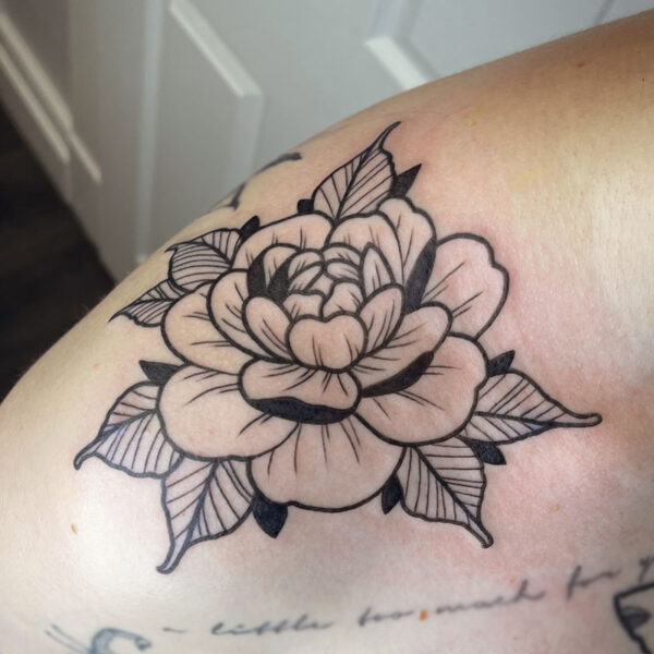 atticus tattoo, black and grey neotraditional tattoo of a rose