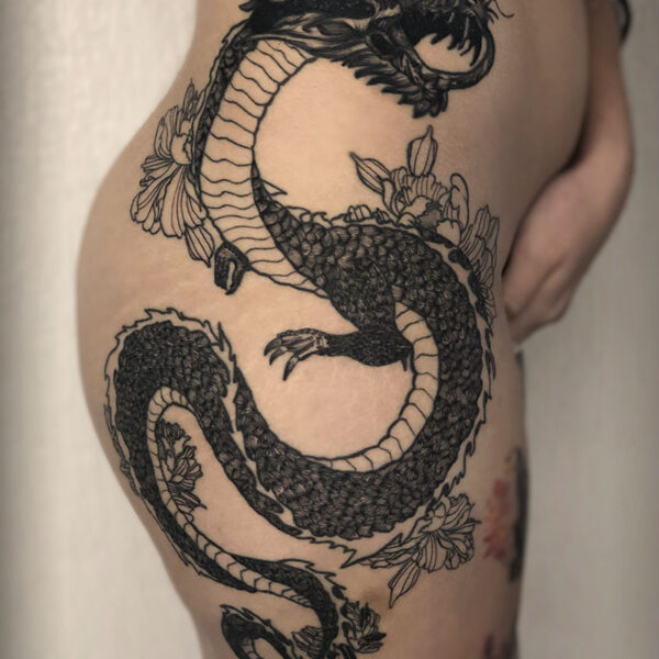 atticus tattoo, black and grey tattoo of an Eastern dragon