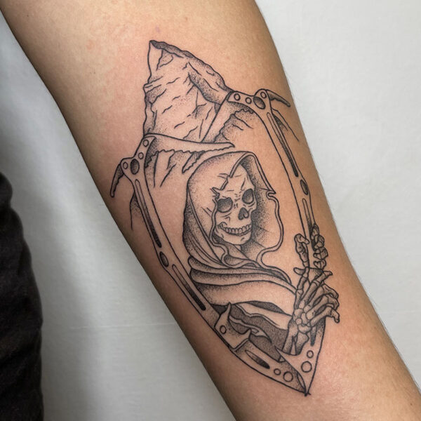 atticus tattoo, black and grey tattoo of an ice climbing grim reaper