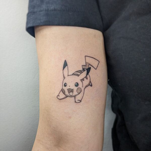 atticus tattoo, black and grey tattoo of Pikachu