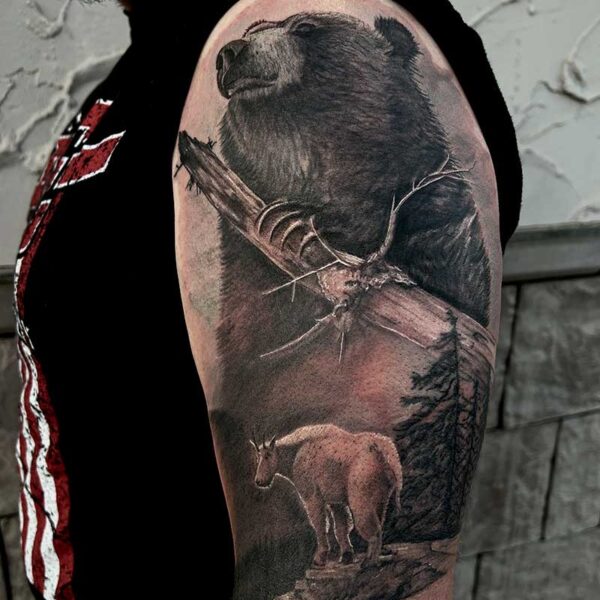atticus tattoo, realism tattoo of a nature scene with a grizzly bear, forest and mountain goat