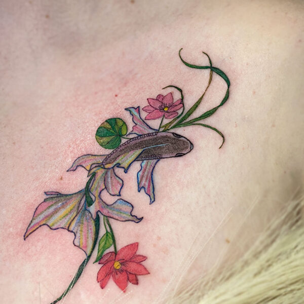 atticus tattoo, coloured tattoo of a beta fish swimming with flowers and lake weed