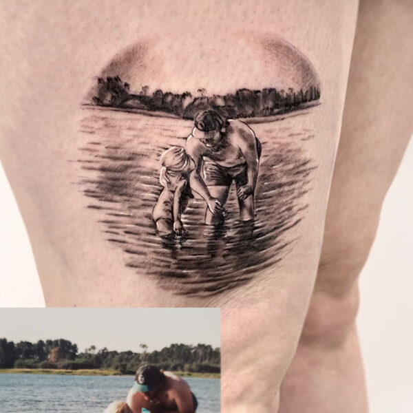 atticus tattoo, black and grey realism tattoo of a father and daughter playing in a lake