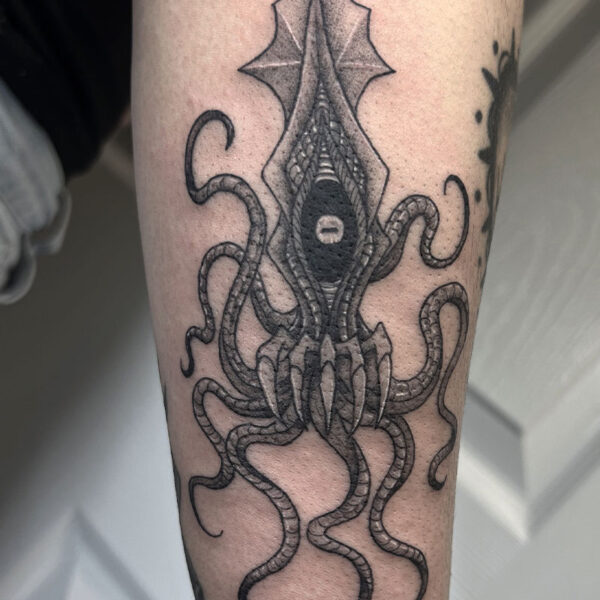 atticus tattoo, black and grey tattoo of a squid monster