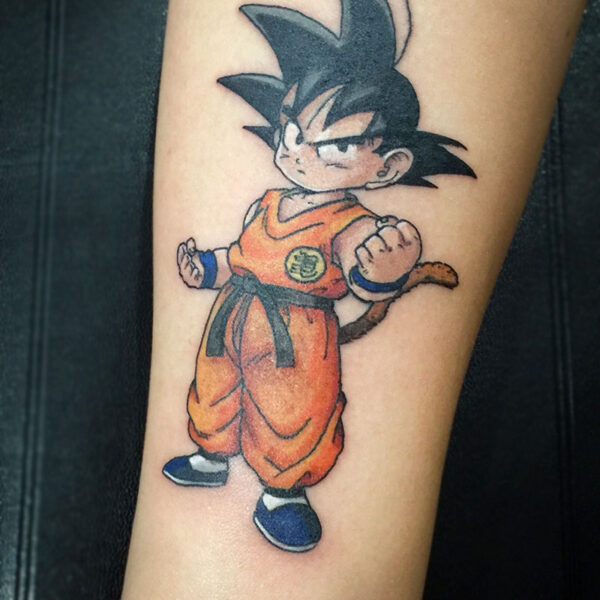 atticus tattoo, coloured tattoo of child Goku from Dragon Ball Z
