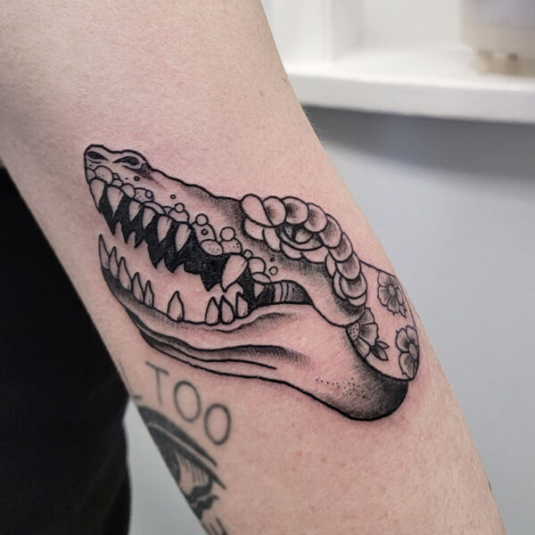 atticus tattoo, american traditional tattoo of a crocodiles head