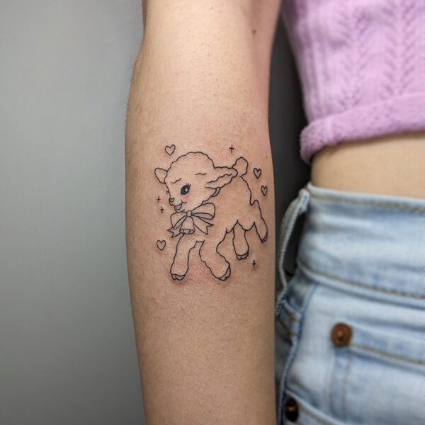 atticus tattoo, fine line tattoo of a cartoon lamb with a bow and hearts