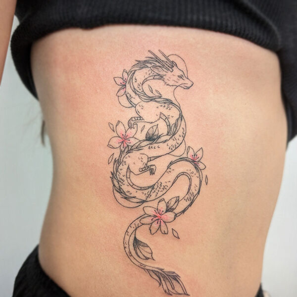 atticus tattoo, fine line tattoo of Haku the dragon from Spirited Away