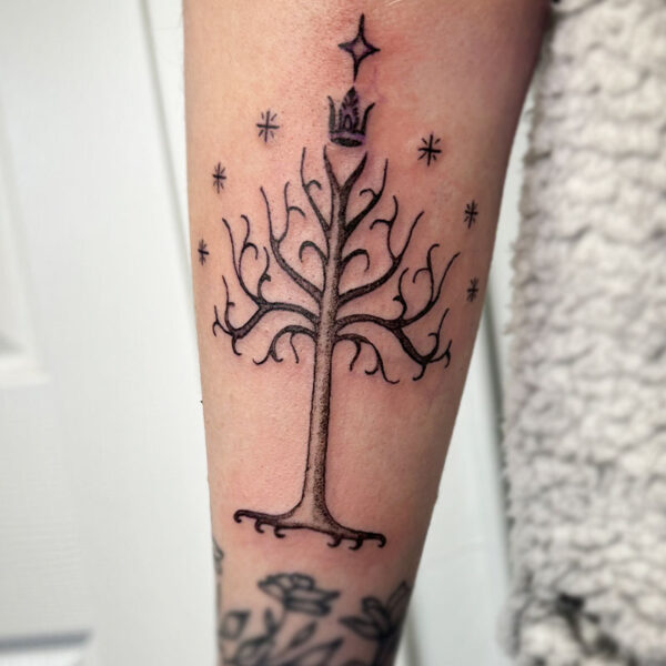 atticus tattoo, black and grey tattoo of a tree from Lord of the Rings