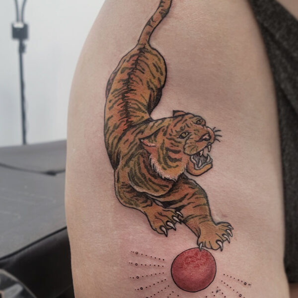 atticus tattoo, coloured traditional tattoo of a tiger and a red sun