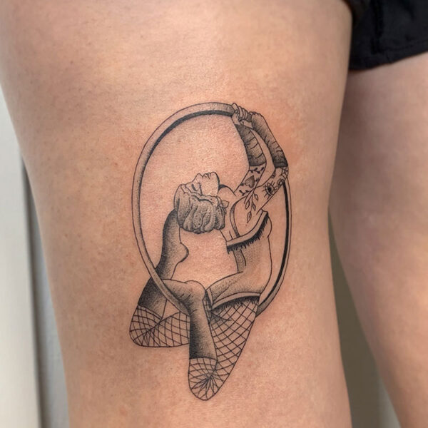 atticus tattoo, black and grey old school tattoo of a circus performer in a ring