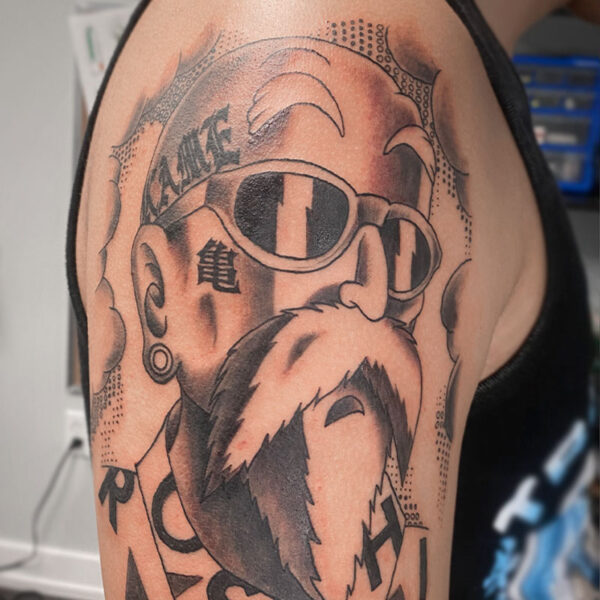 atticus tattoo, black and grey anime tattoo of Master Roshi from Dragon Ball Z