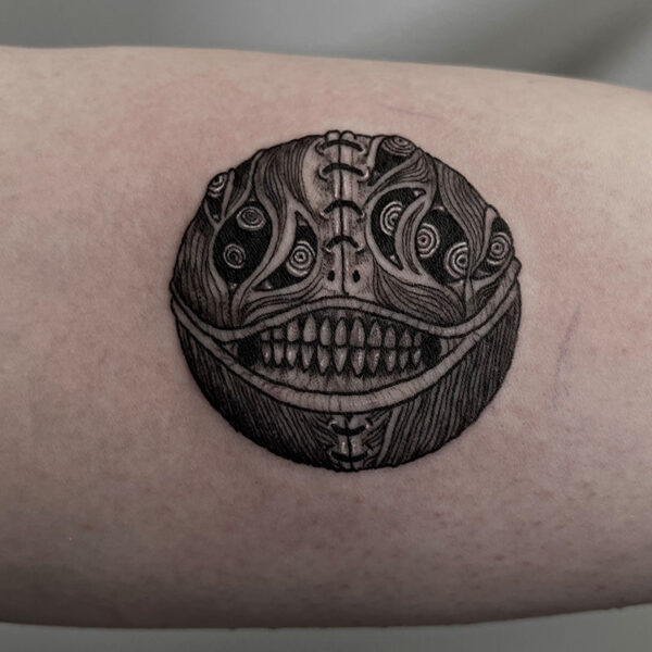 atticus tattoo, black and grey tattoo of Emil from Nier Automata