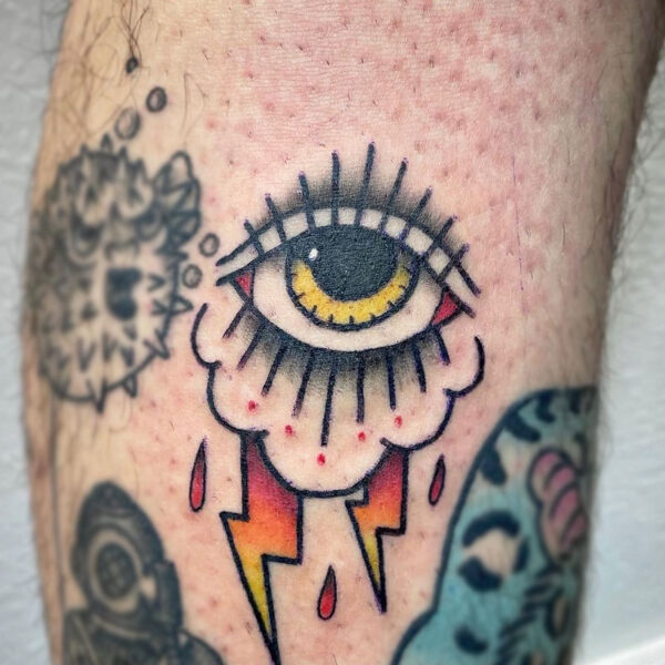 atticus tattoo, American Traditional tattoo of an eyeball with a storm cloud