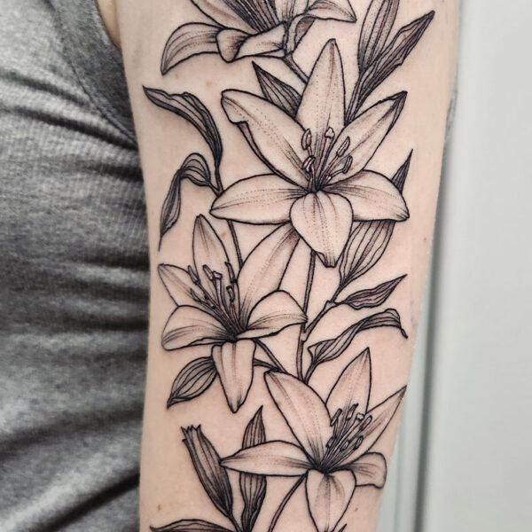 atticus tattoo, black and grey tattoo of lilies