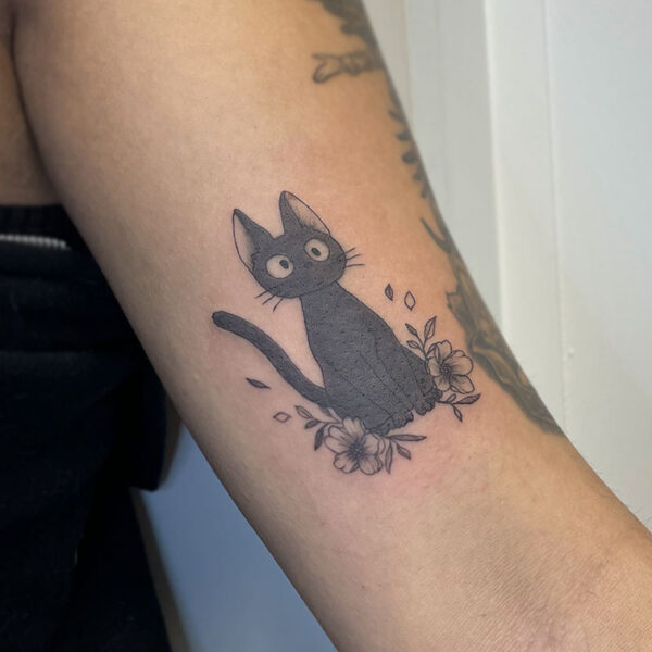 atticus tattoo, anime tattoo of the cat from "Kiki's Delivery Service"