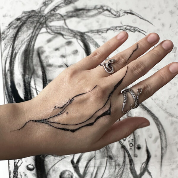 atticus tattoo, black and grey tattoo of abstract lines