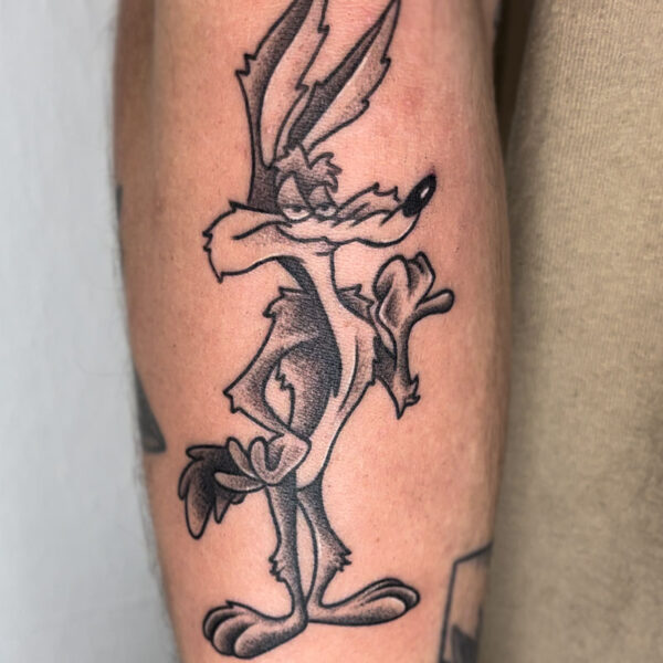 atticus tattoo, black and grey tattoo of Wiley Coyote from Looney Tunes