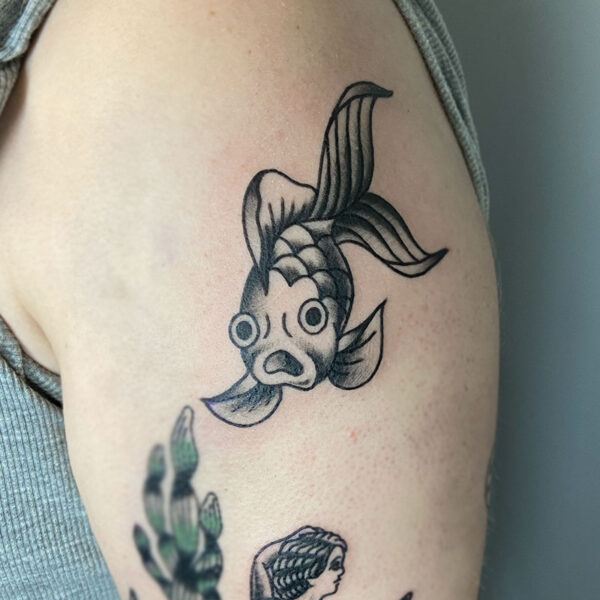atticus tattoo, black and grey, American traditional tattoo of a goldfish