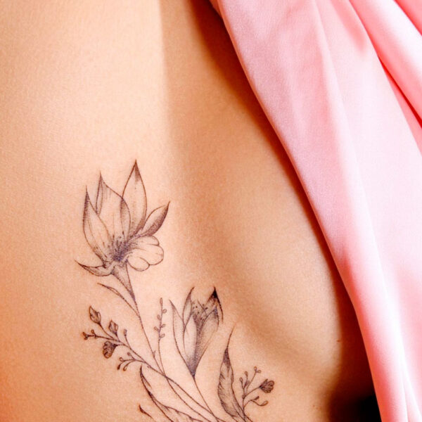 atticus tattoo, black and grey tattoo of flowers