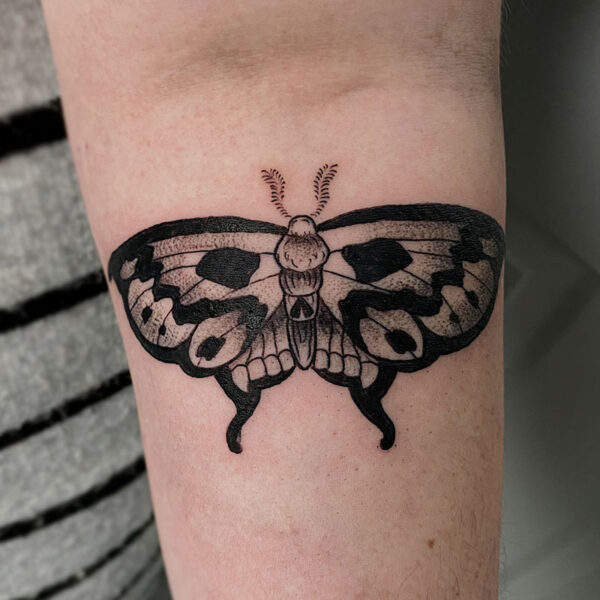 atticus tattoo, black and grey tattoo of a death moth