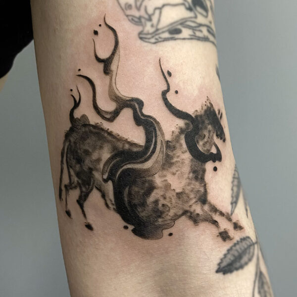 atticus tattoo, black and grey tattoo of a painting of a cave horse with smoky swirls around it