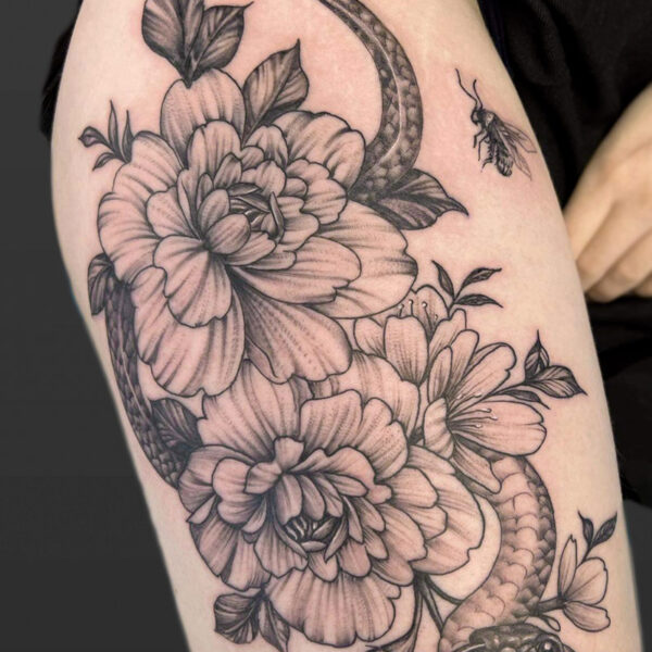 Atticus Tattoo| Fine line tattoo of two peonies with a snake and bumblebee