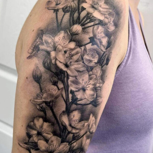 Atticus Tattoo| Black and grey, realism tattoo of cherry blossom branches