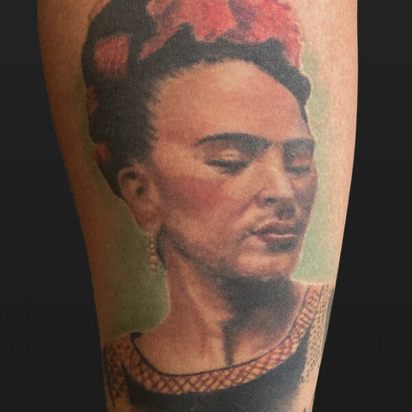 Atticus Tattoo| Colour realism tattoo of a portrait Frida Kahlo
